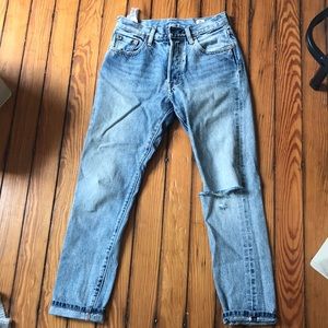 Levi’s 501s with distressed knee